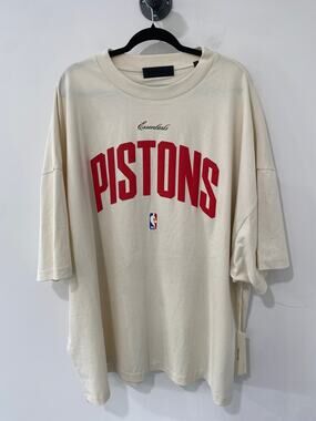NWT Fear of God ESSENTIALS NBA Men’s Pistons Tee Cream Size XXL